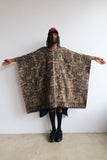 Walter Van Beirendonck New Eyes Poncho FW23