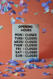 Opening Hours Tea Towel - Third Drawer Down X David Shrigley